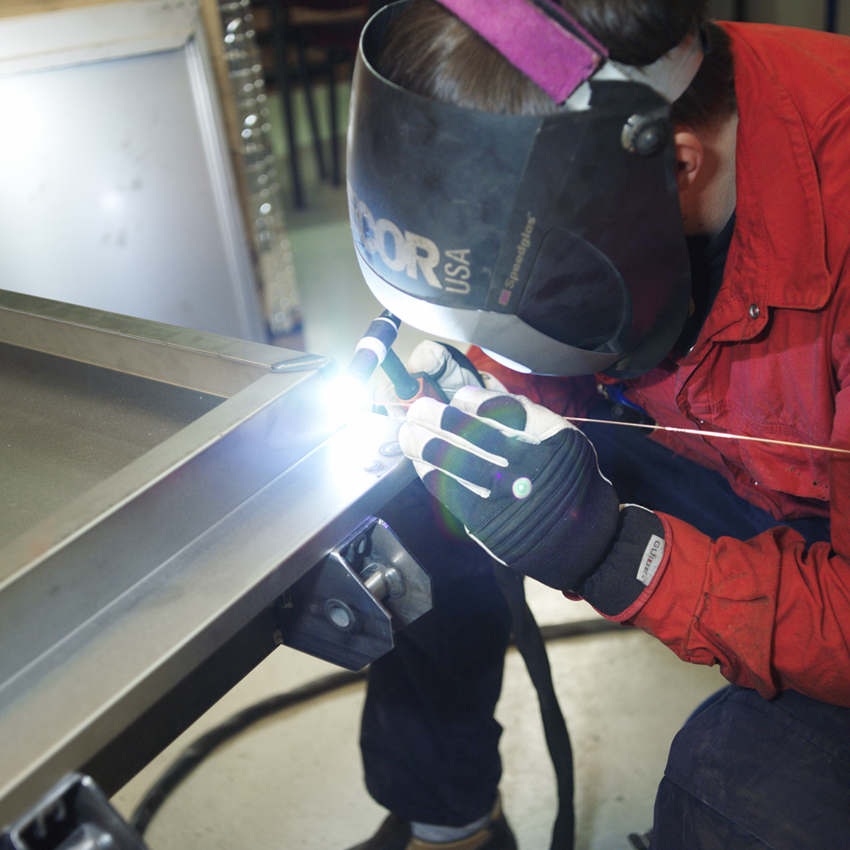 Welding a frame.